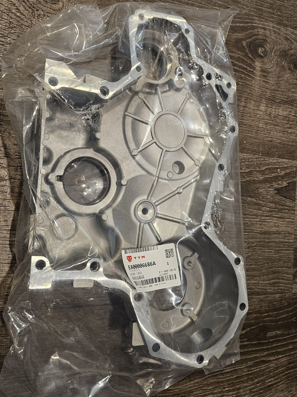 TYM Branson (OEM) Timing Cover Part #EA00006686A
