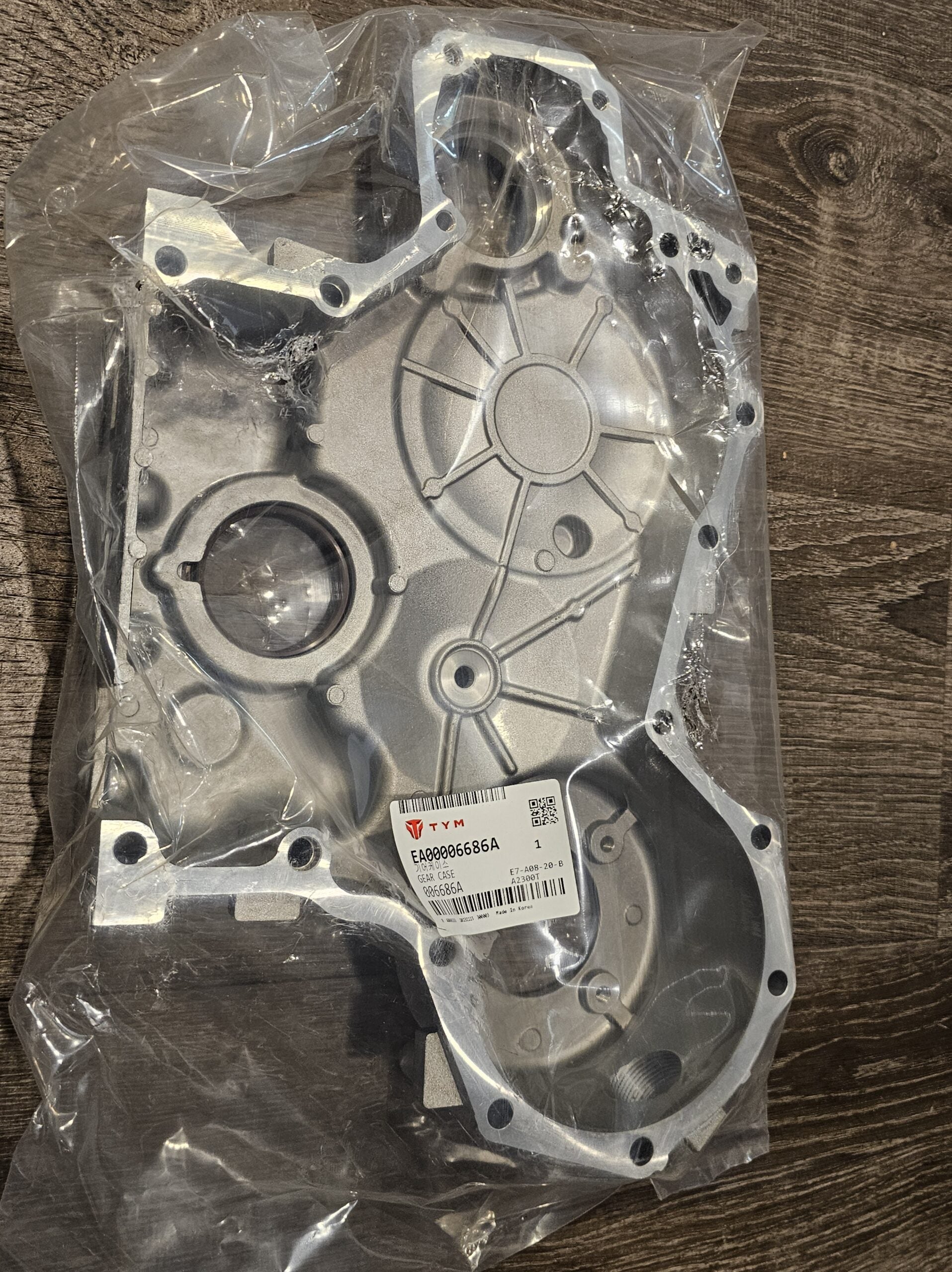 TYM Branson (OEM) Timing Cover Part #EA00006686A